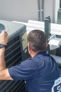 New high-efficiency air conditioner installed by a contractor.