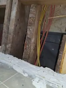 Outdated electrical service lines on an older home.