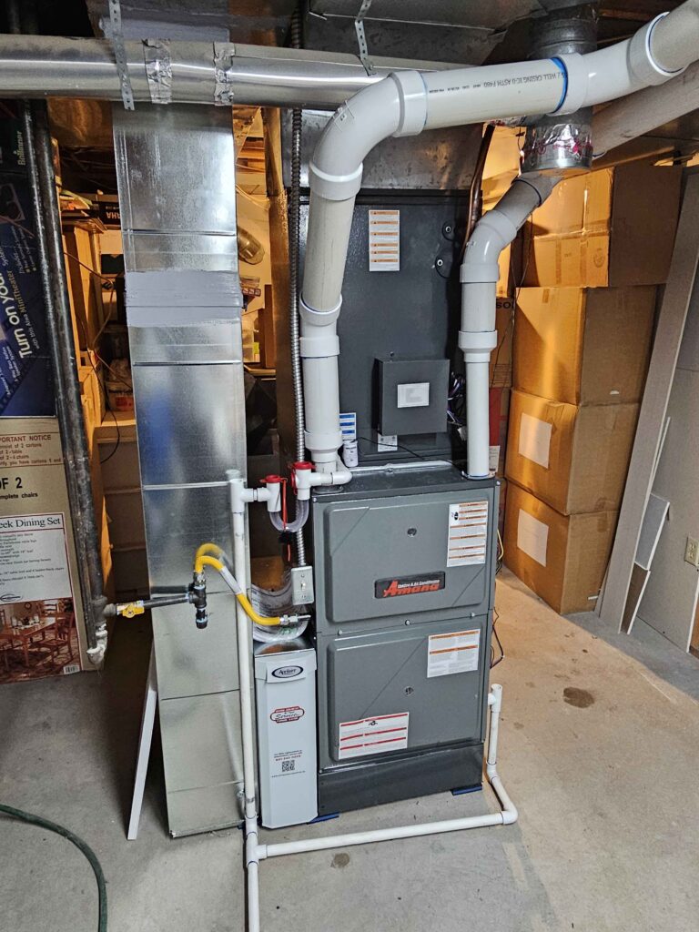 High-efficiency modulating furnace installed in a small utility room